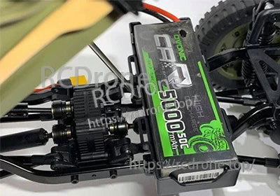 OVONIC 5000mAh 2S LiPo battery installed in an RC car battery tray with wiring routed to the ESC