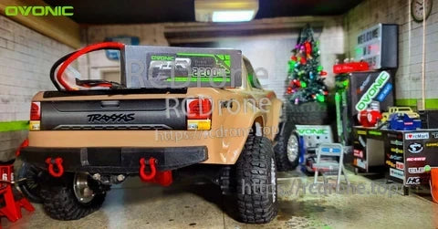 OVONIC 3S 11.1V 2200mAh LiPo battery placed on an RC truck, compact soft-pack size for hobby battery bays