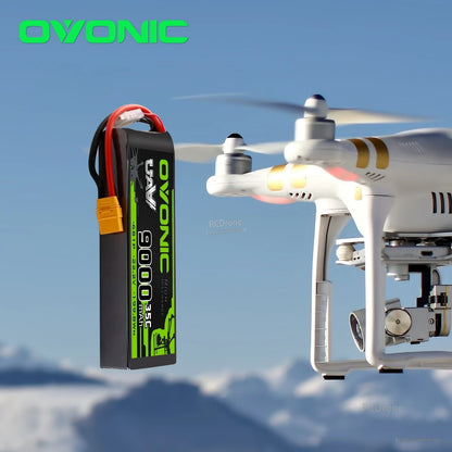 OVONIC 6S 9000mAh 22.2V 35C LiPo Battery shown beside a quadcopter drone