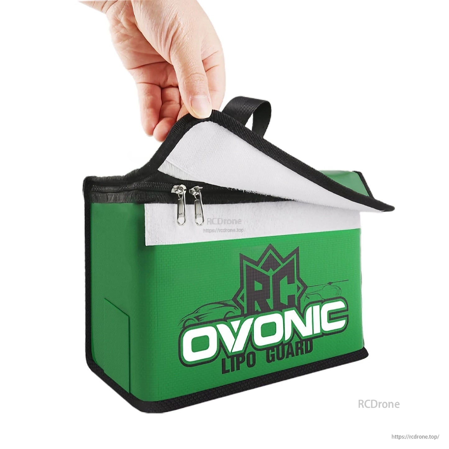 Close-up of the bag’s lifted Velcro flap, white inner lining, and dual zipper closure