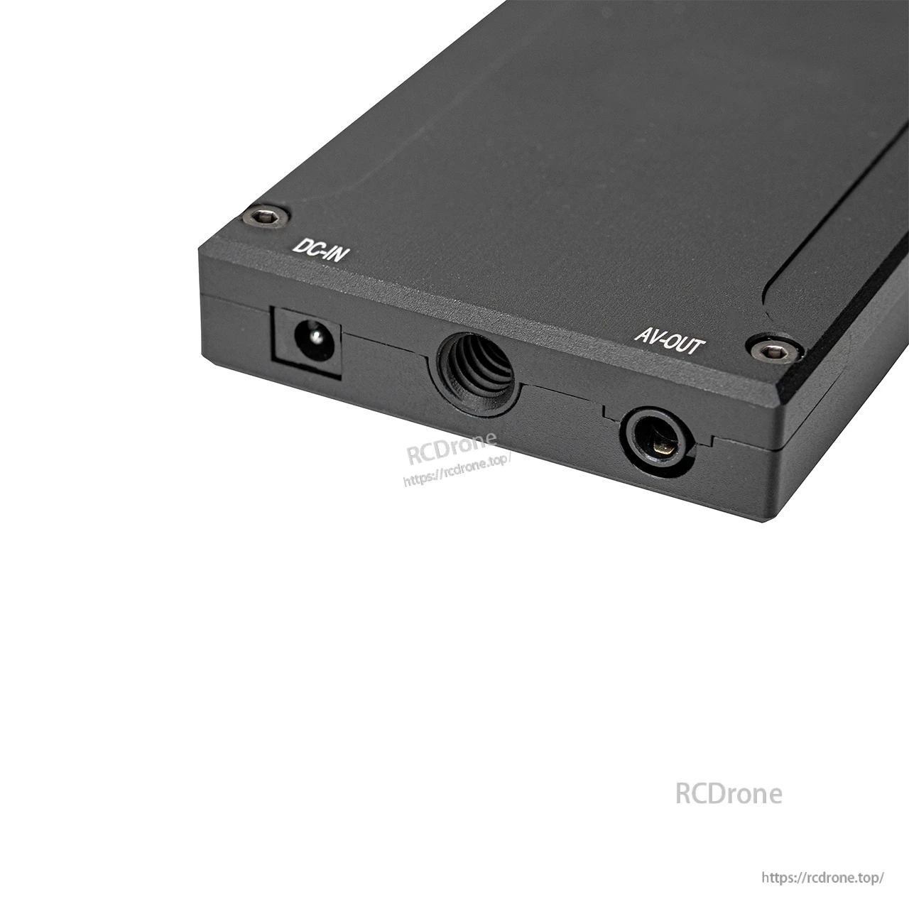 Rear edge close-up showing DC-IN power jack and AV-OUT port on the receiver