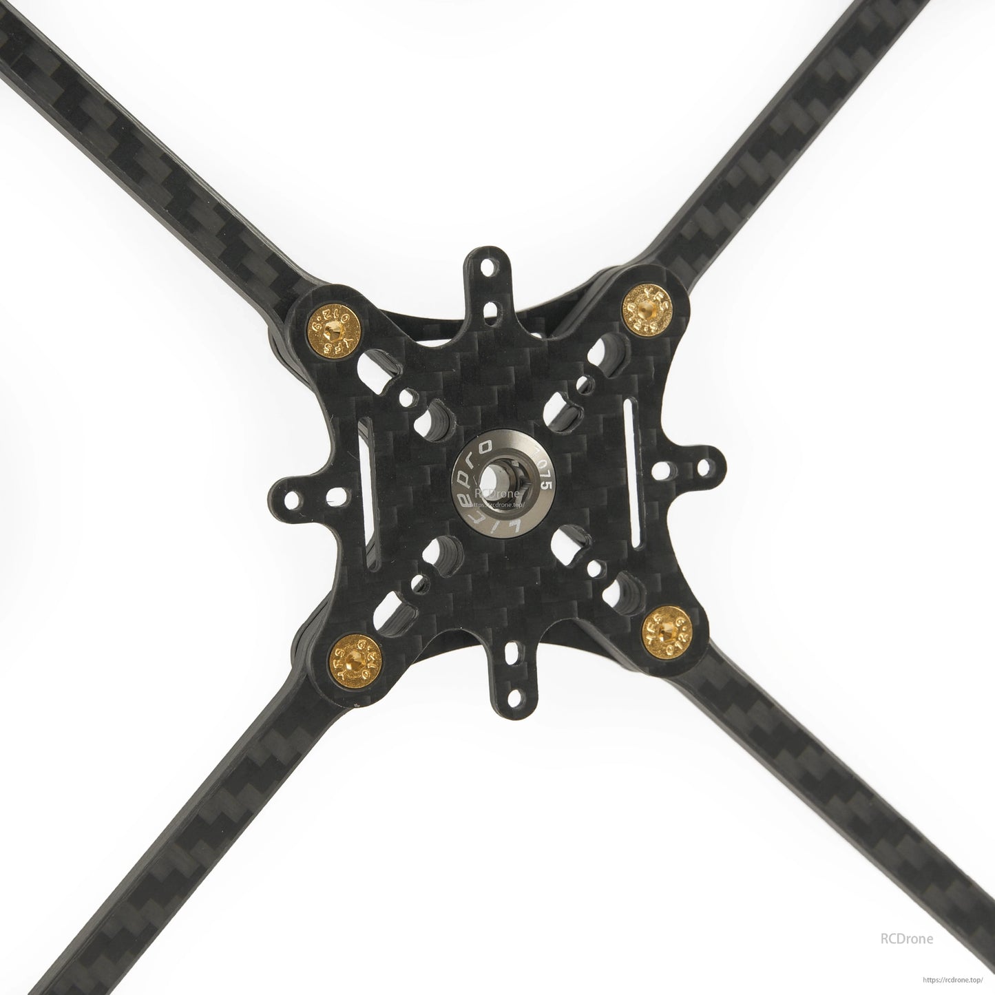 Close-up of carbon fiber center plate with mounting holes and gold standoffs on toothpick frame