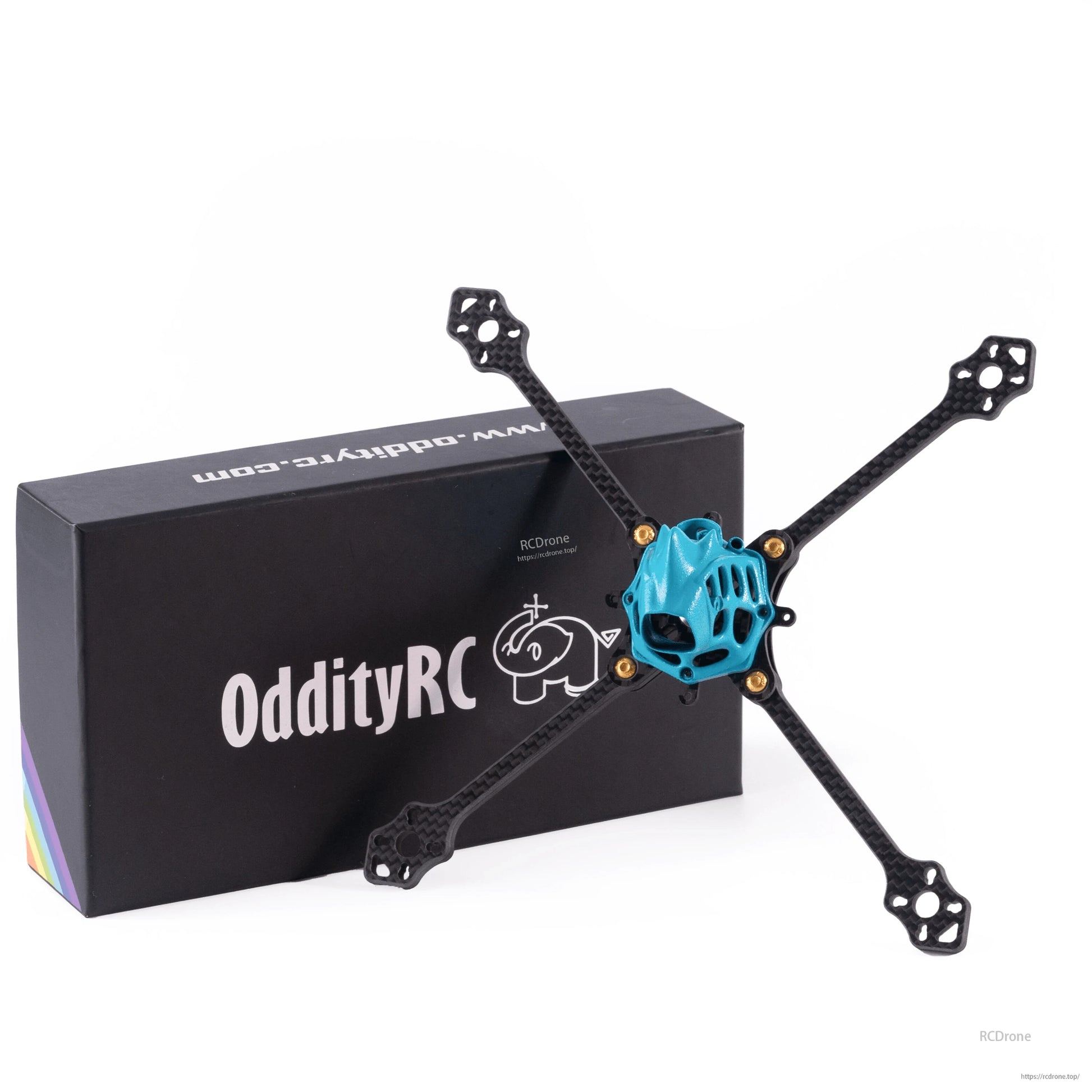 OddityRC 4/5inch toothpick frame kit angled view with blue camera canopy in front of branded box