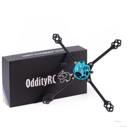 OddityRC 4/5inch toothpick frame kit angled view with blue camera canopy in front of branded box