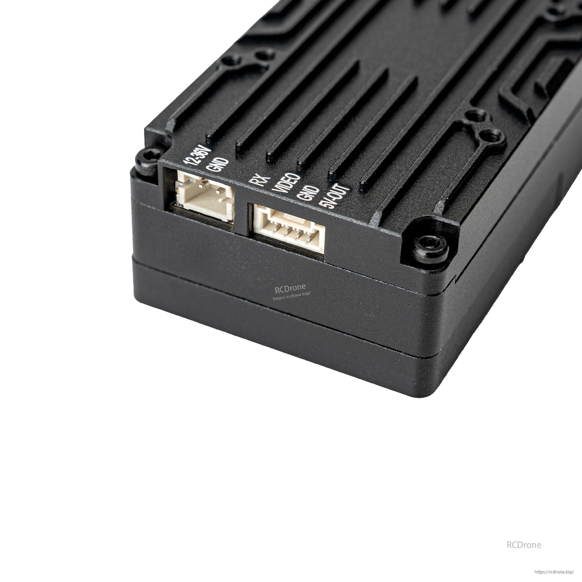 VTX underside showing 12–36V power input port and multi-pin control/serial connector
