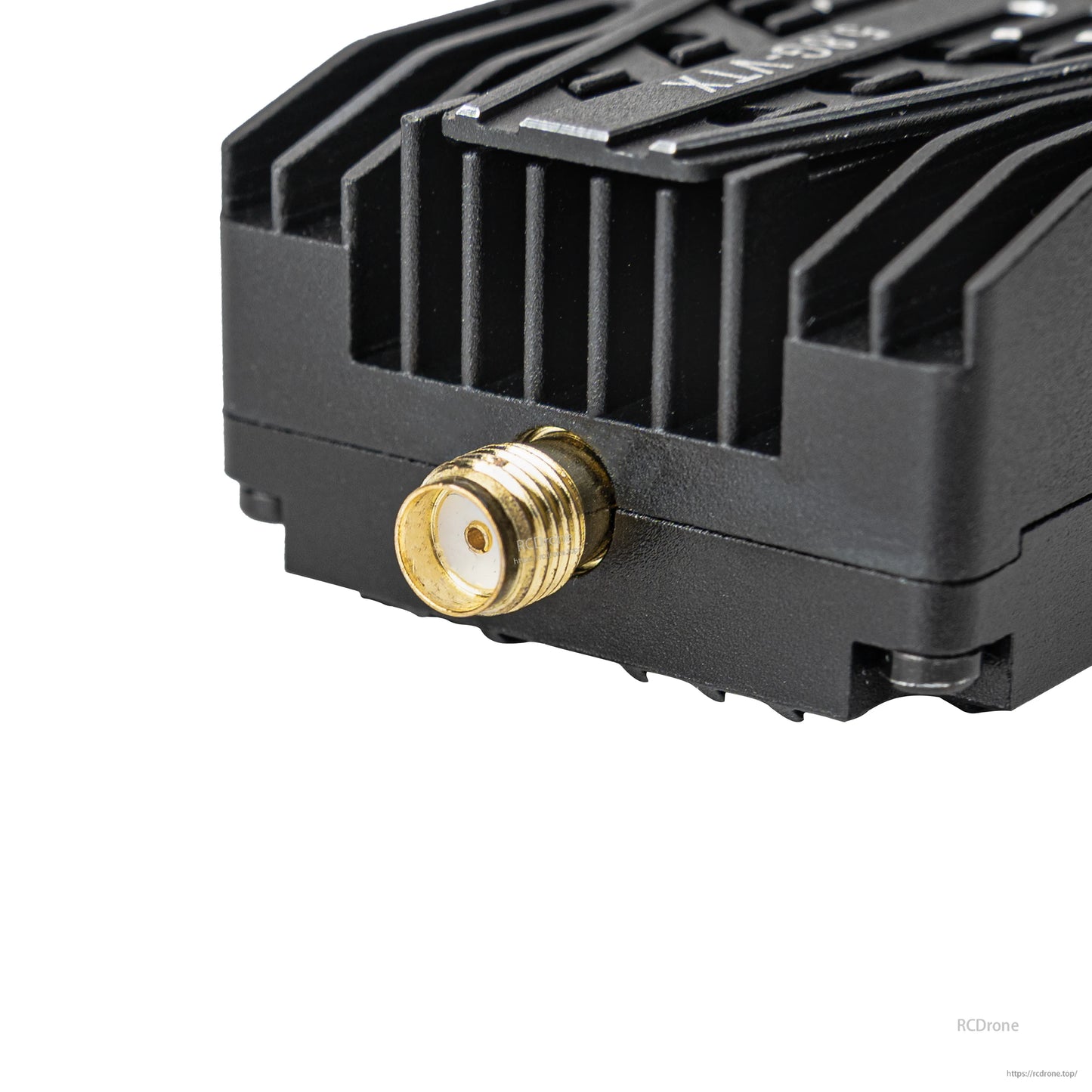 Close-up of SMA antenna connector on the FPV video transmitter heatsink body