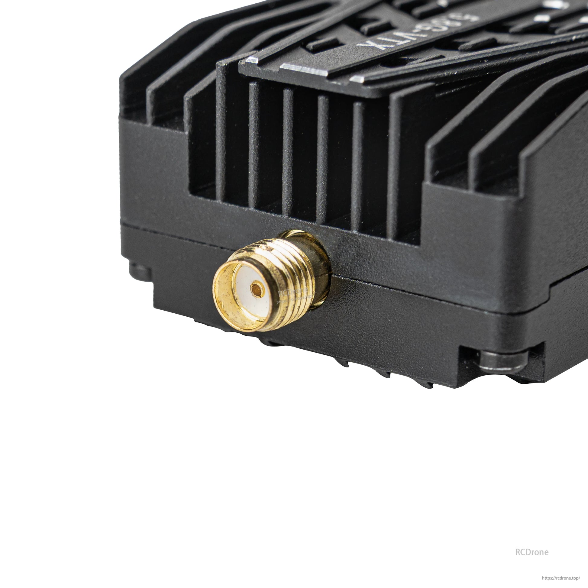 Close-up of SMA antenna connector on the FPV video transmitter heatsink body