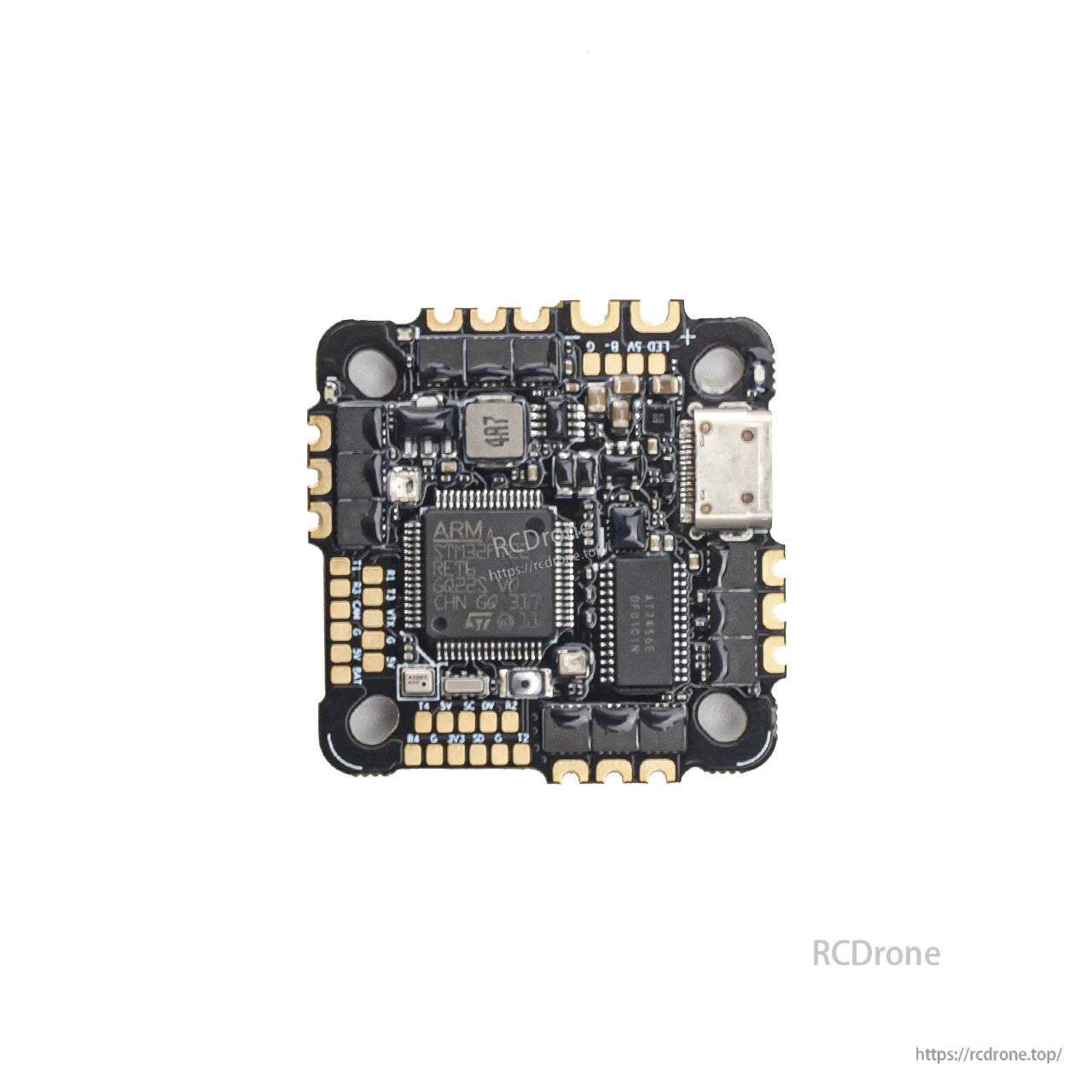 Component side close-up showing MCU, power components, and USB-C port on the AIO board