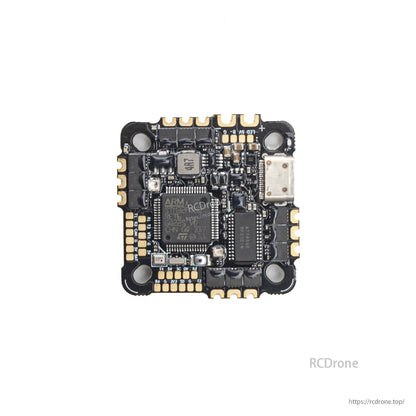 Component side close-up showing MCU, power components, and USB-C port on the AIO board
