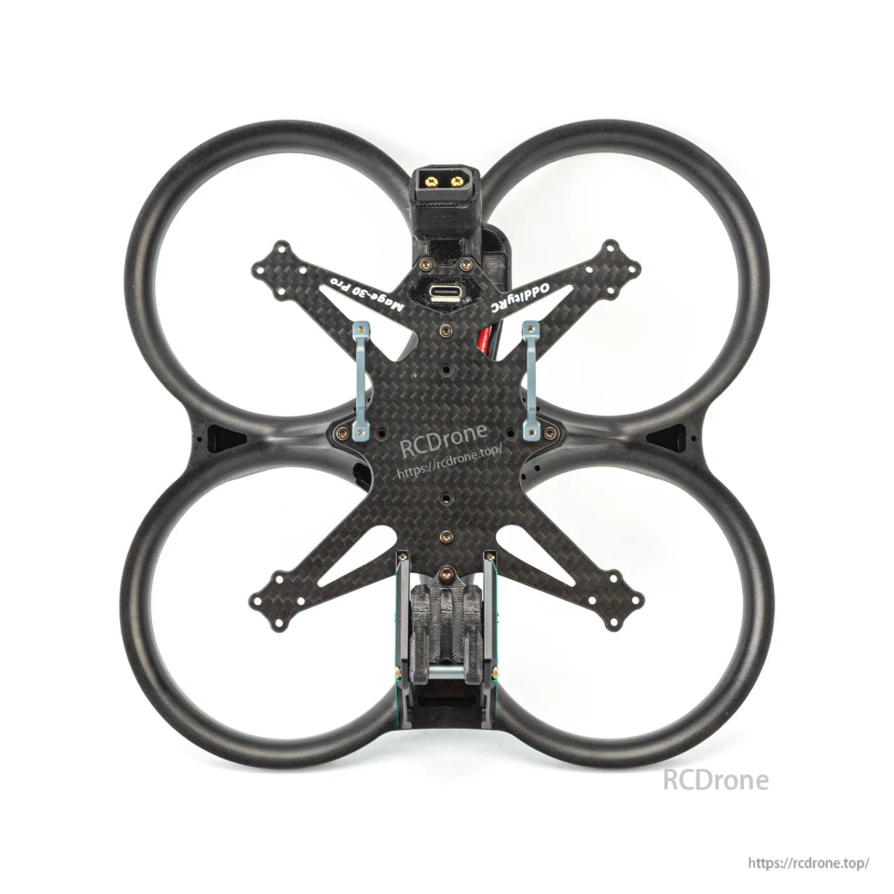 OddityRC Mage-Pro Frame Kit top-down view showing four ducts, carbon fiber X plate, and mounts