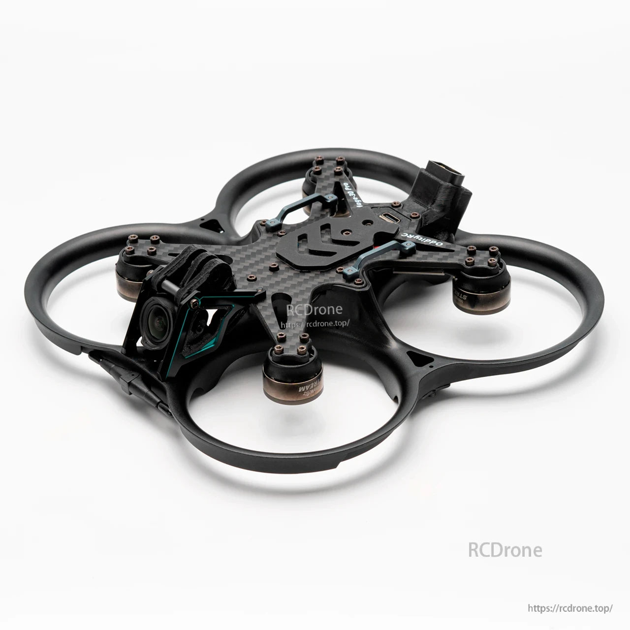 Assembled ducted quad view showing camera mount, motor mounts, and carbon top plate layout