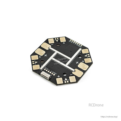 Angled underside view showing power traces, solder pads, and edge connector on the distribution board