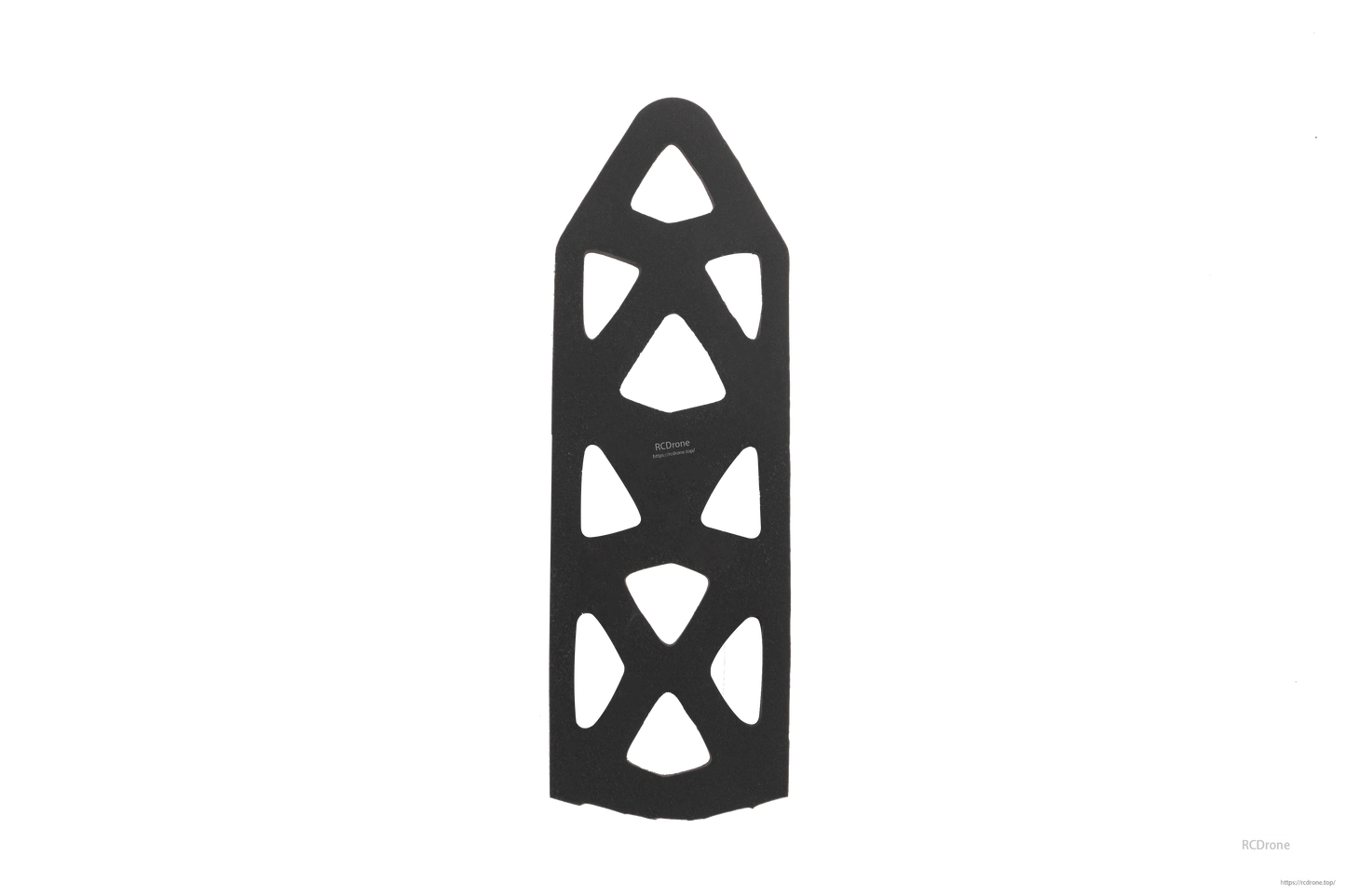 Black tapered plate cover with geometric cutouts, alternate angle on dark background