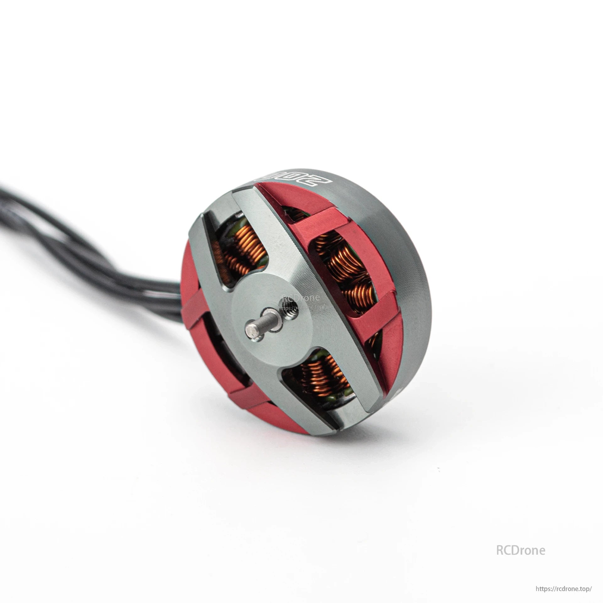 Angled side view of OddityRC Spinnybois 2004 2650KV motor showing shaft and open-frame windings