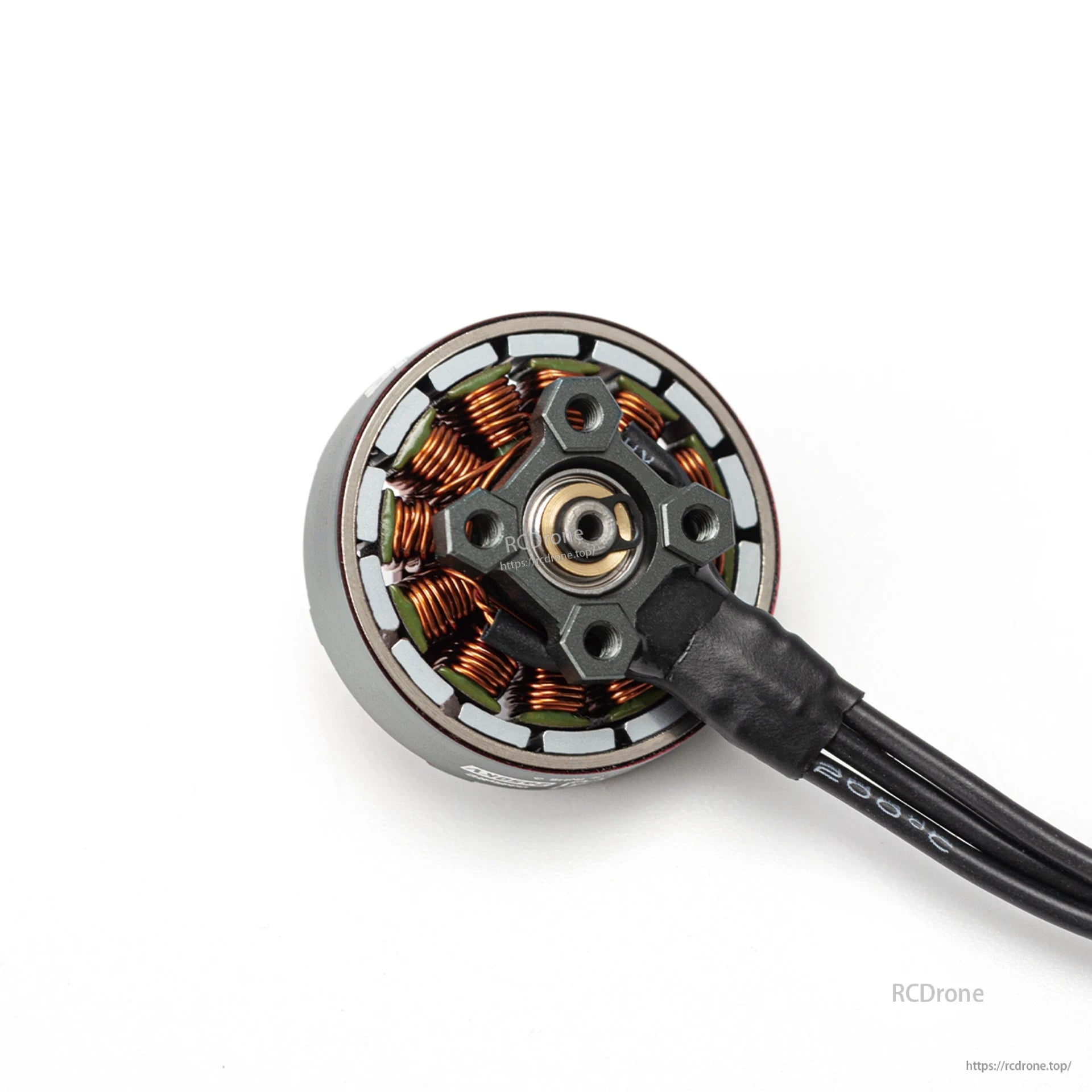 Bottom view showing motor base, mounting holes, center bearing area, and cable exit