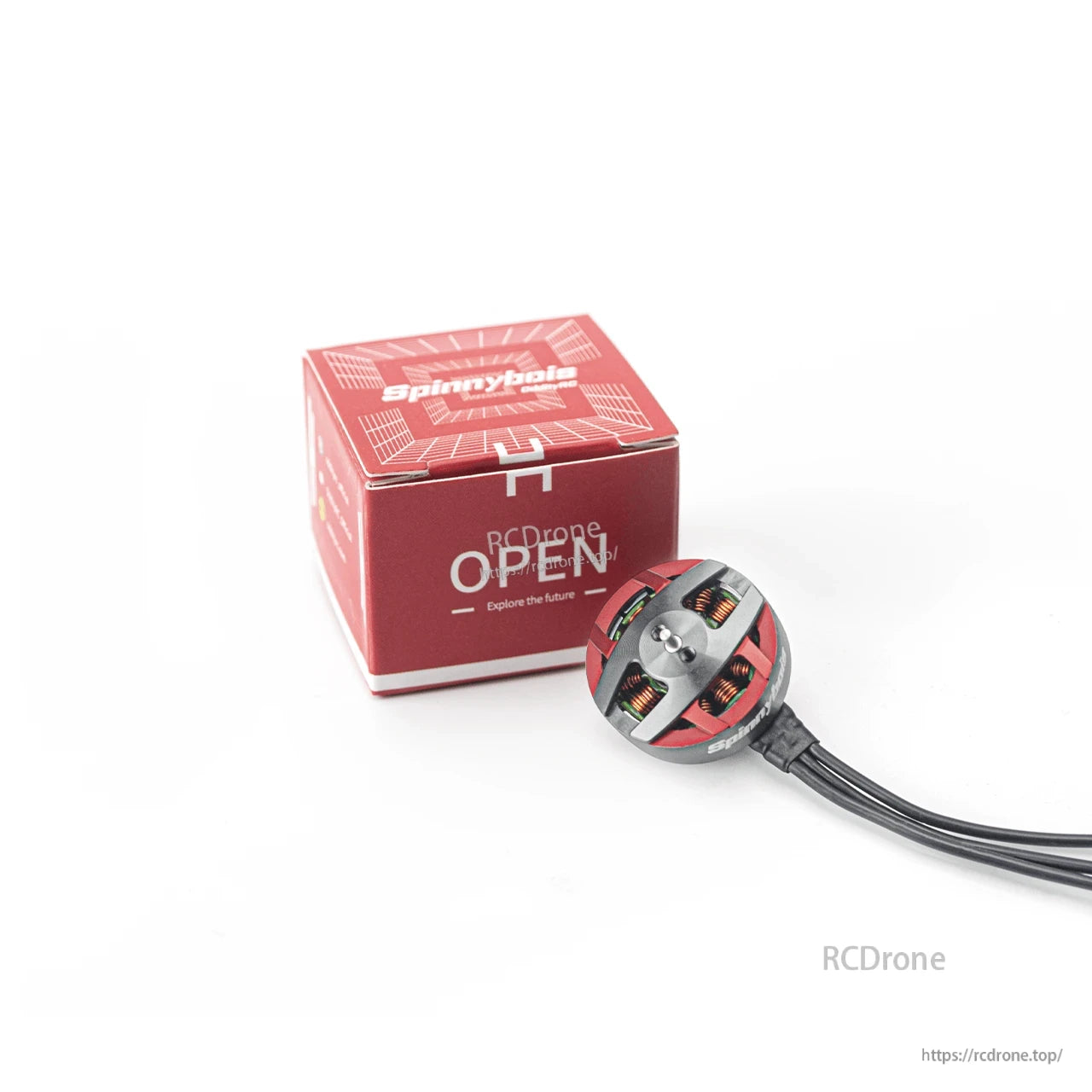 Spinnybois motor with retail box packaging, showing included motor and branded box together