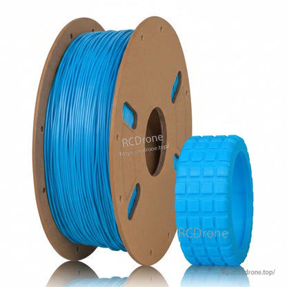 Light blue filament on cardboard spool with tread ring sample print