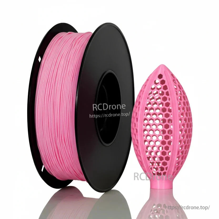 Light pink filament spool with honeycomb lattice football-shaped sample print