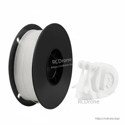 White flexible TPU 3D printer filament spool on black reel, with small translucent 3D-printed part