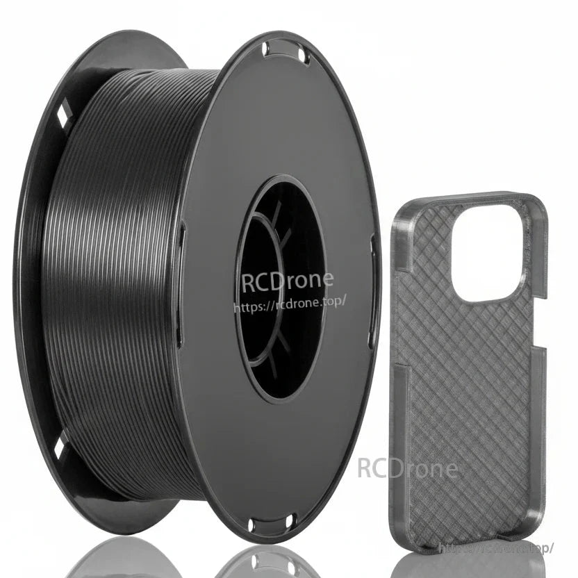 Black TPU 3D printer filament spool with a flexible, textured phone case sample print beside it