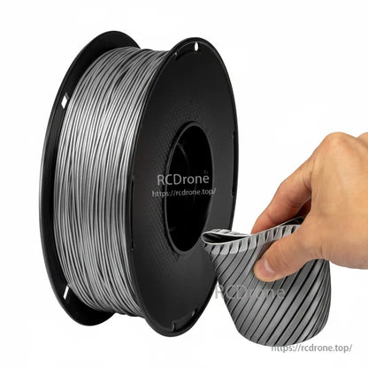 Silver-gray filament spool with hand holding flexible ribbed cup or sleeve print