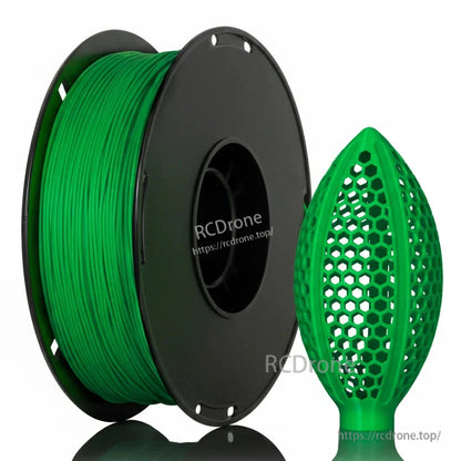 Green filament spool with honeycomb lattice football-shaped sample print