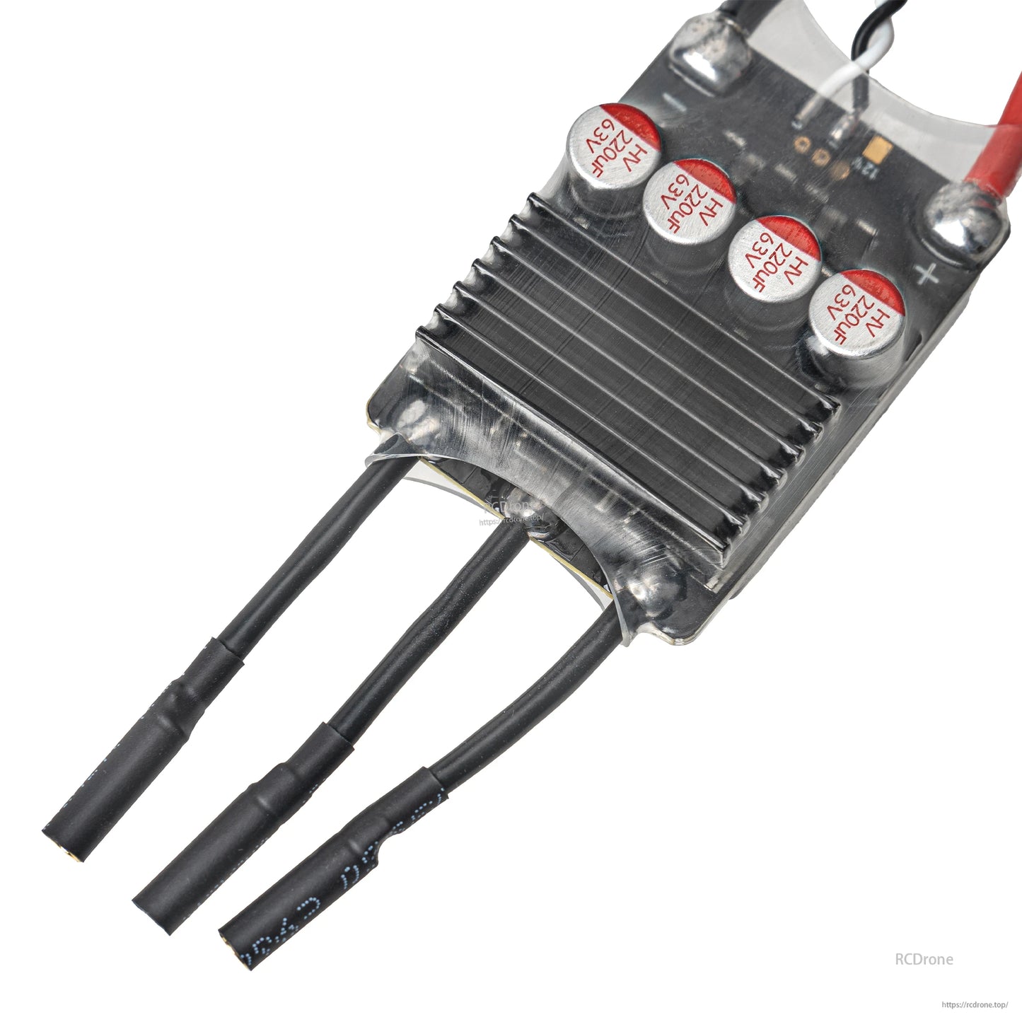 Close-up of heatsink end with three motor wire leads and protective heatshrink on each wire