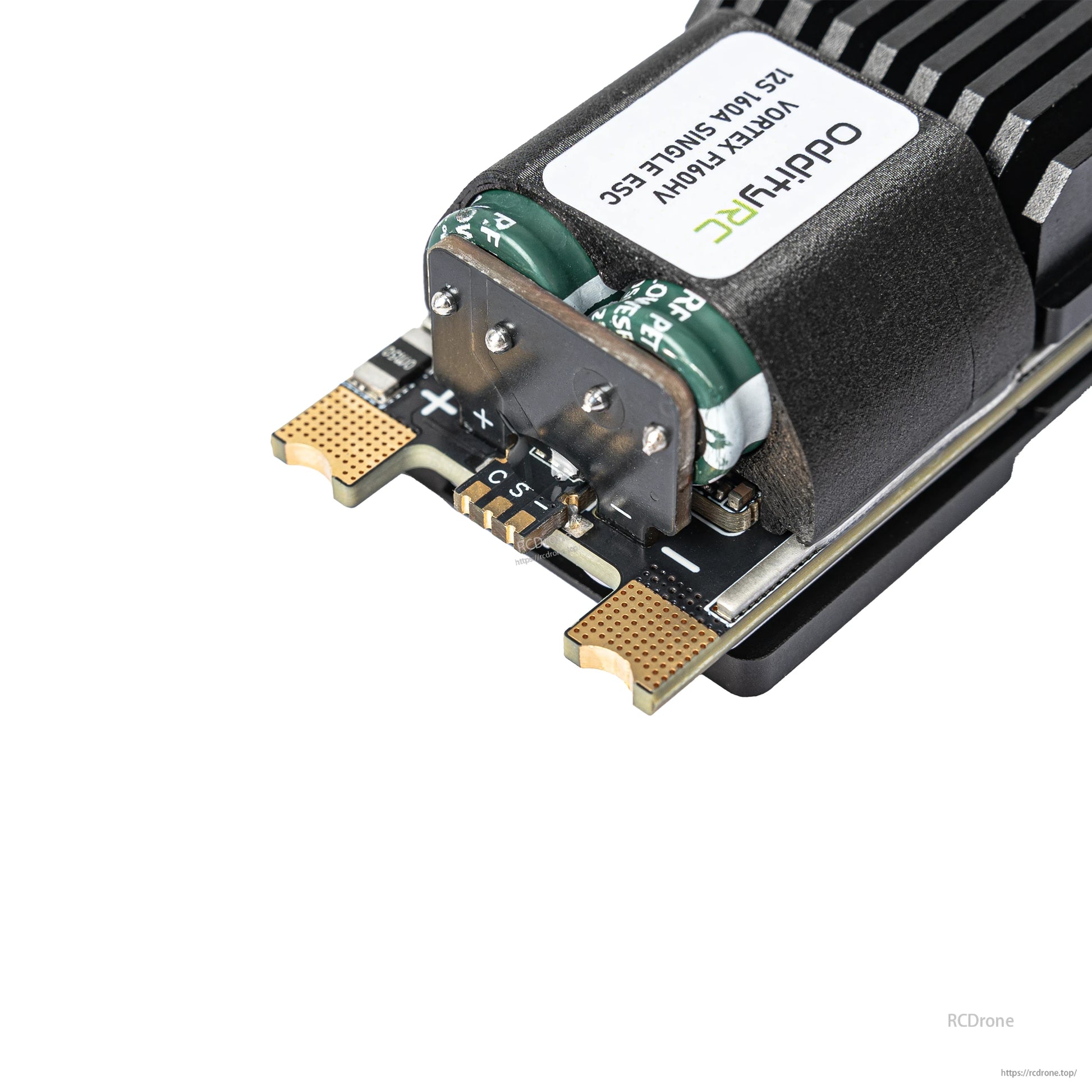 Close-up of ESC power pad area with plus/minus markings and soldered terminal plate