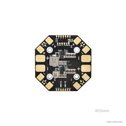 Octagonal power distribution/wiring board with + and − pads and mounting holes, top view