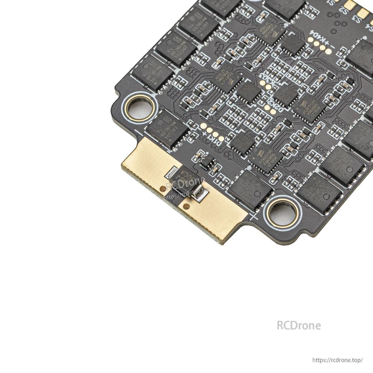 Close-up of battery power pads and nearby components on the ESC underside
