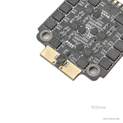 Close-up of battery power pads and nearby components on the ESC underside