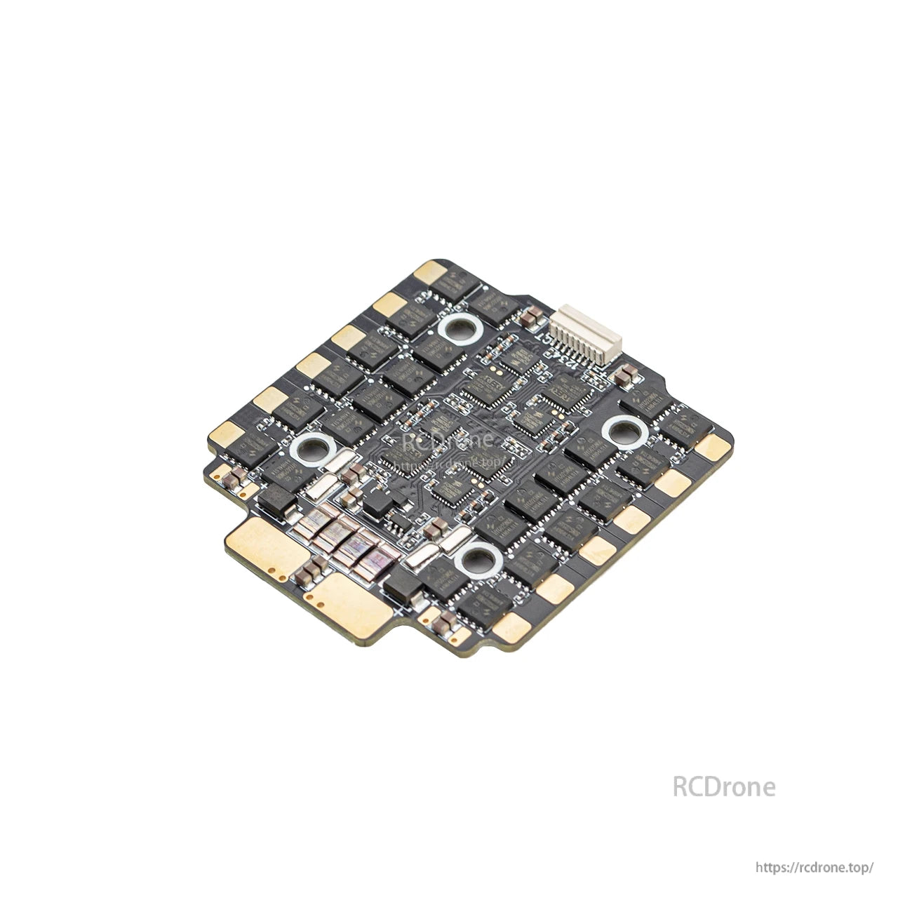 Angled view of 4-in-1 drone ESC board showing solder pads, mounting holes and JST plug