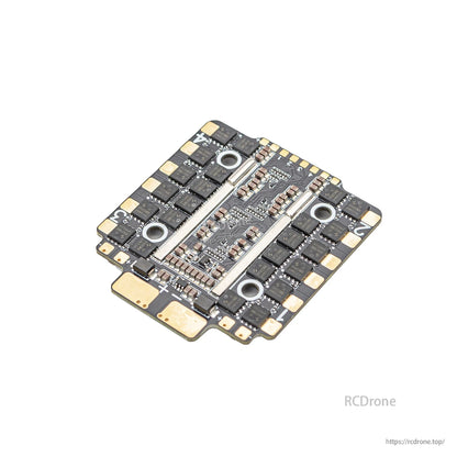 Angled top view of ESC board highlighting central power section and numbered motor pads