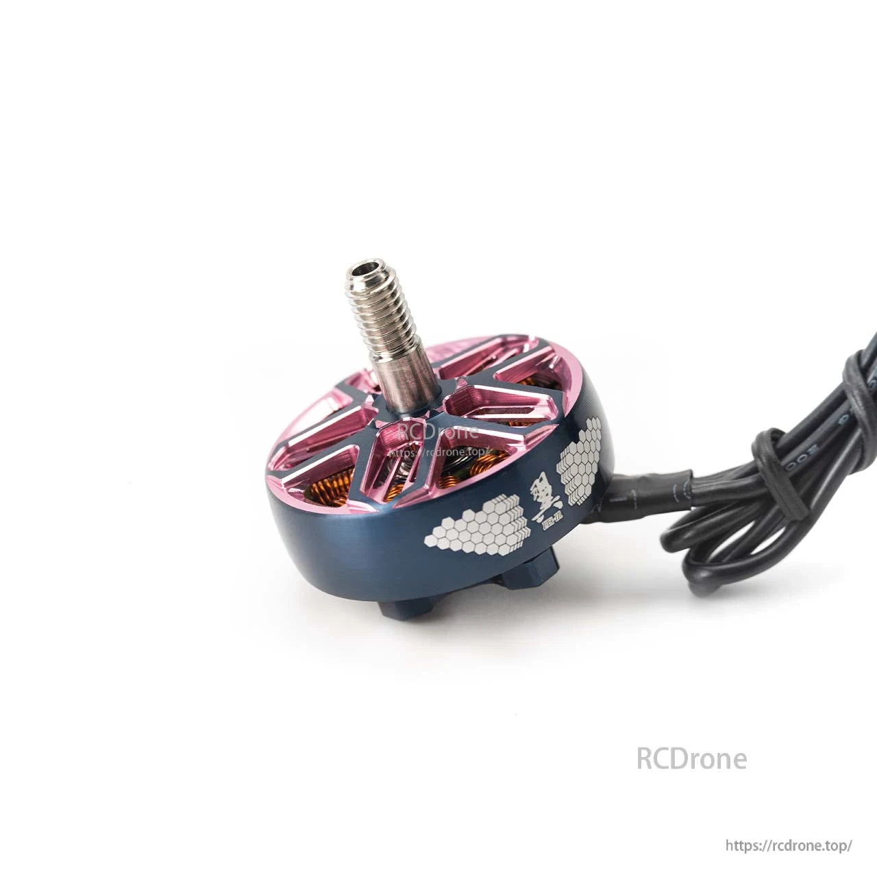 Angled side view of brushless motor with pink rotor, black can, honeycomb graphic, and cable