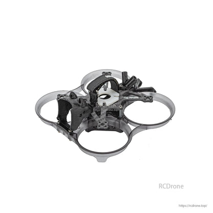 Angled view of XI20 Pro cinewhoop frame highlighting camera cage, battery strap, and prop guard ducts