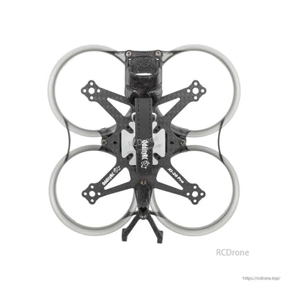 Top-down view of OddityRC XI20 Pro frame with four prop ducts, camera mount, and carbon fiber X plate