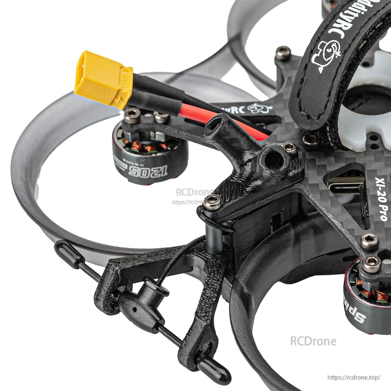 Close-up of XT30 battery connector lead and rear mount hardware on the ducted cinewhoop frame
