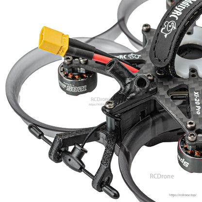 Close-up of XT30 battery connector lead and rear mount hardware on the ducted cinewhoop frame