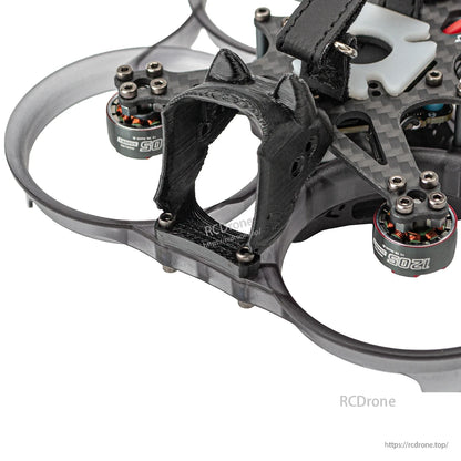 Close-up of front camera cage mount and duct guard section with carbon fiber top plate and motor