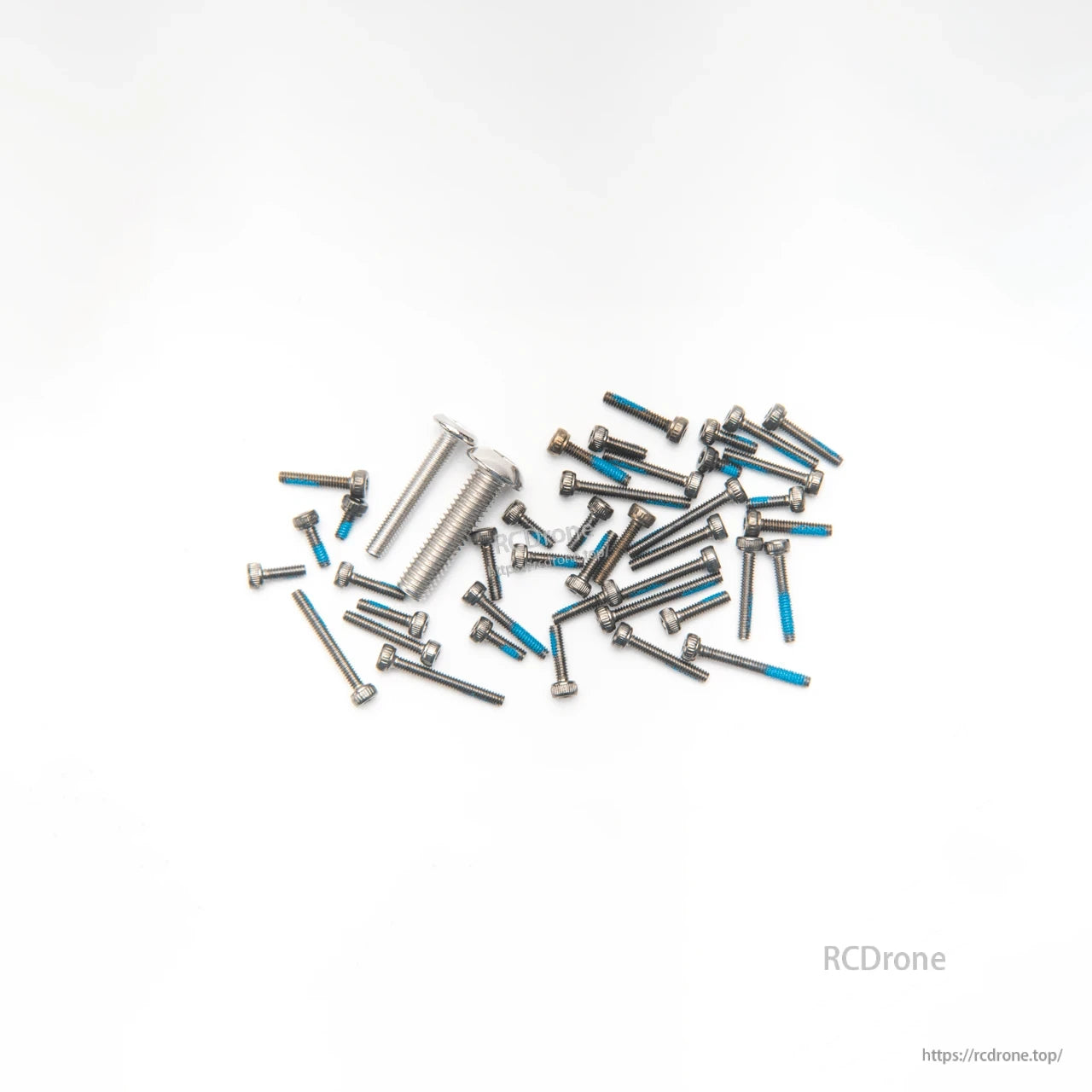 Assorted screws and bolts set with blue threadlocker for frame assembly