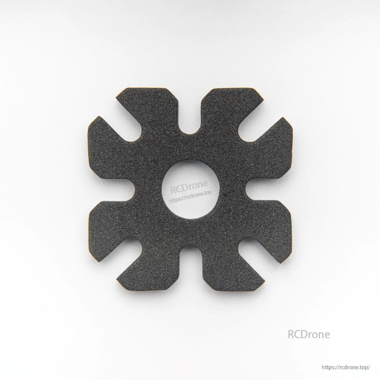 Black foam isolation pad with center hole and eight cutouts