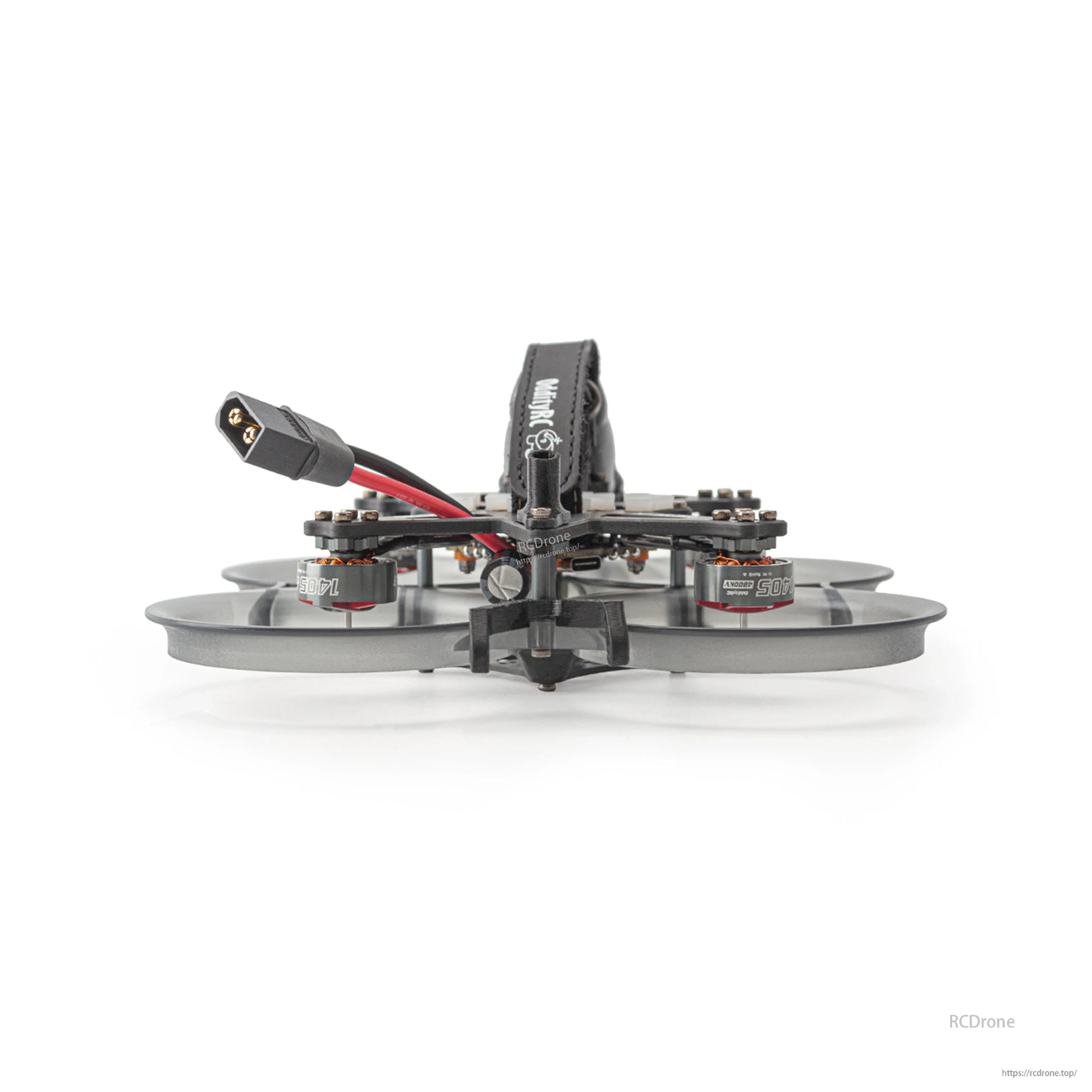Rear view showing battery strap on top plate, motor layout, and pigtail exiting the frame