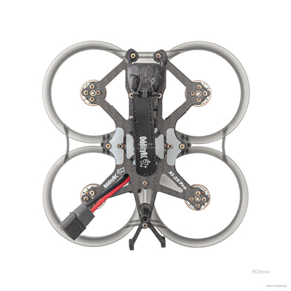 Top-down view of ducted frame showing motor mounts, battery strap, and compact 2.5-inch prop guards