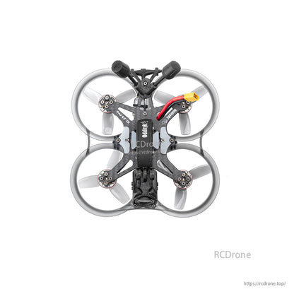 Top-down view showing four ducted props, carbon frame layout, and battery lead routing
