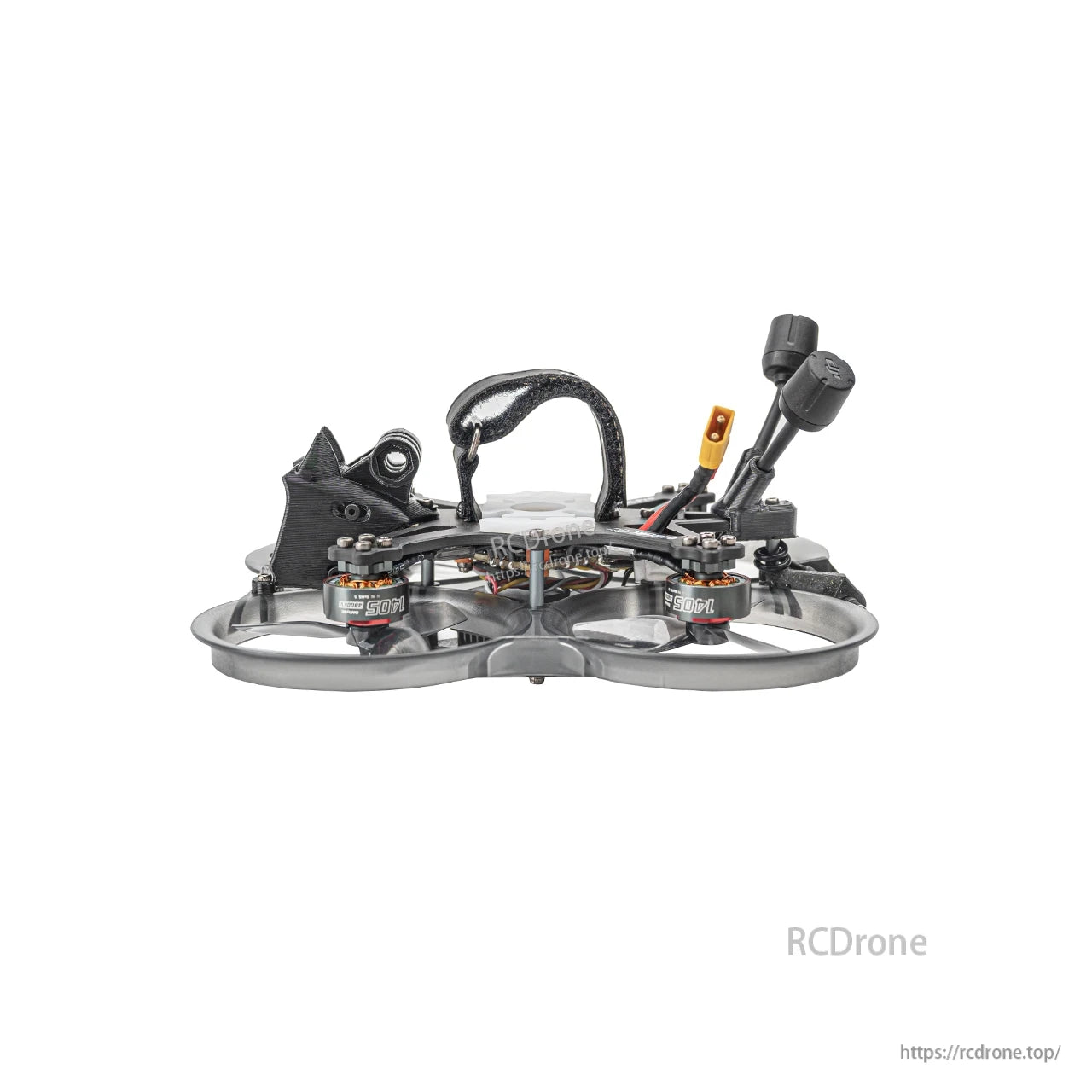 Side profile of ducted FPV quad showing carbon frame, battery strap, and rear antennas