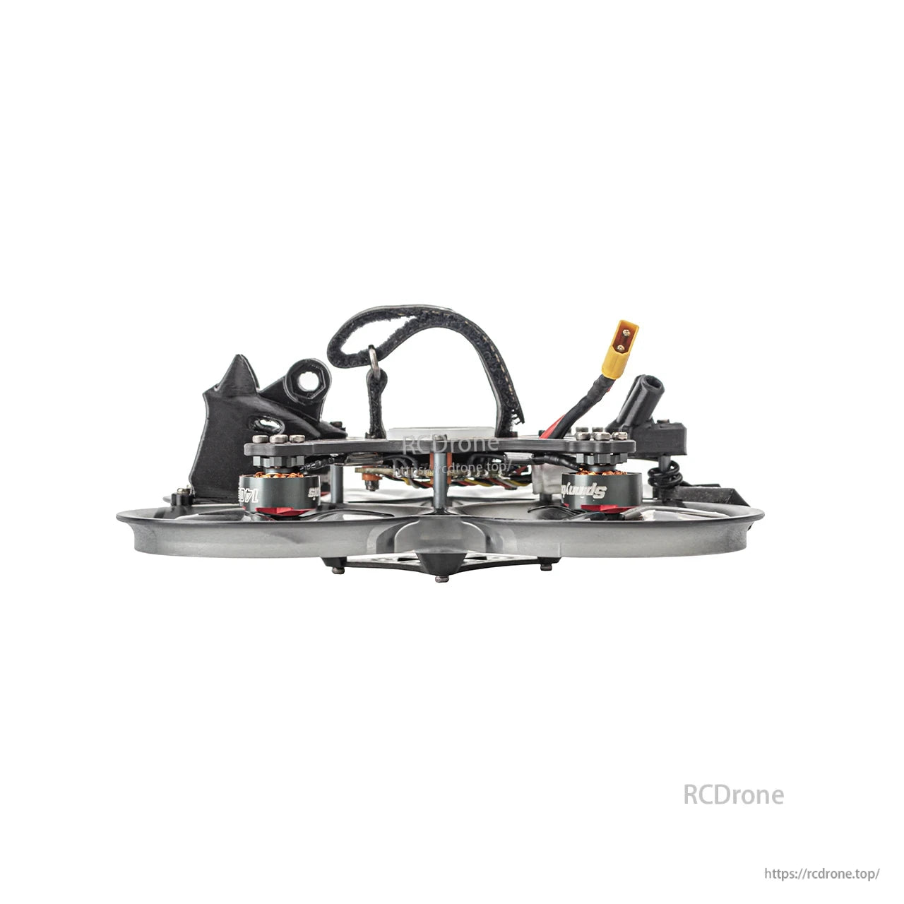 Side profile of ducted FPV drone showing carbon frame stack, battery strap loop, and XT30 power connector