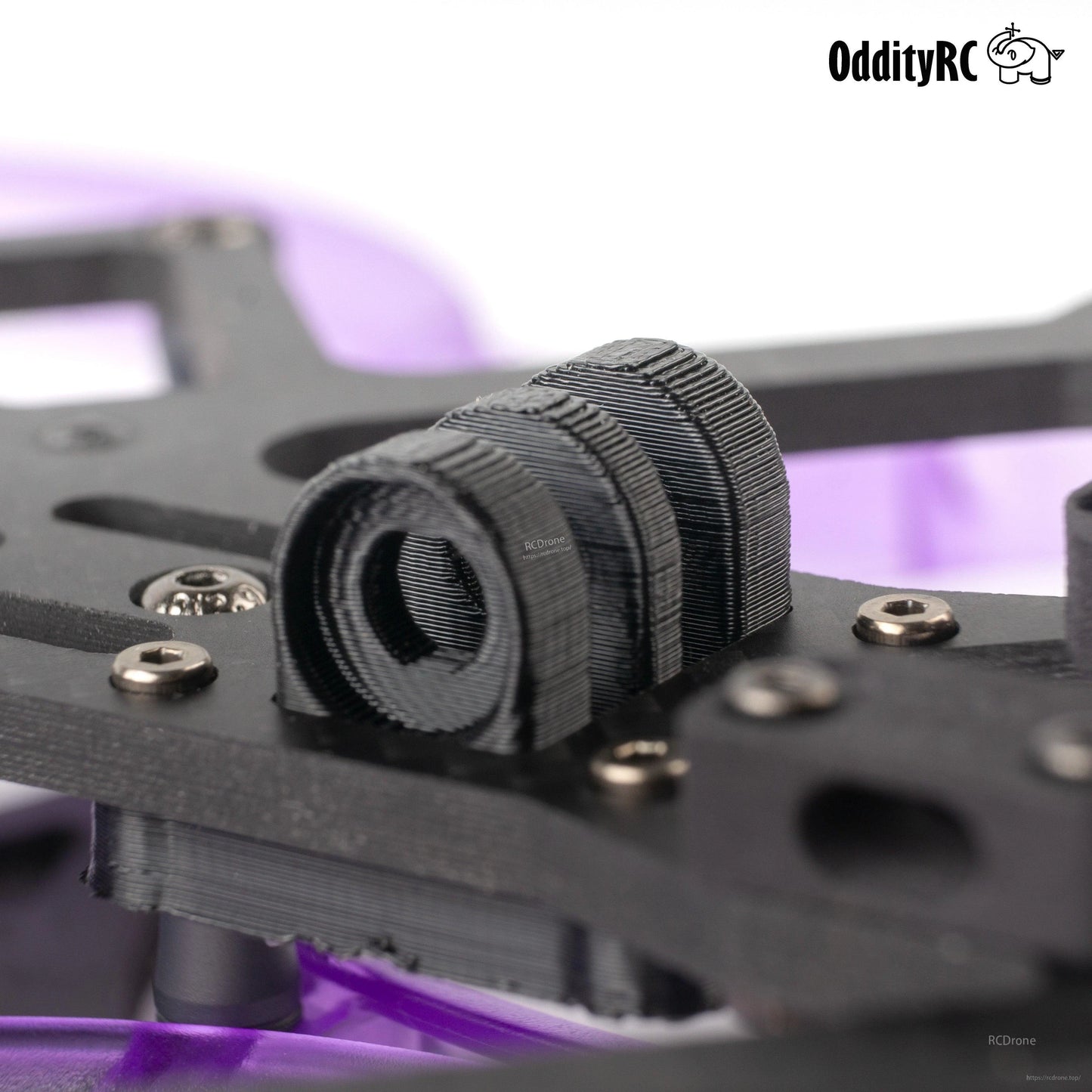 Close-up of 3D-printed FPV camera mount on XI35 Pro carbon frame