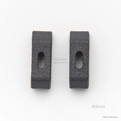 Pair of black foam battery pads with oval slots, two-piece set