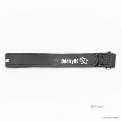 OddityRC branded black battery strap with stitched edge and metal buckle, side view