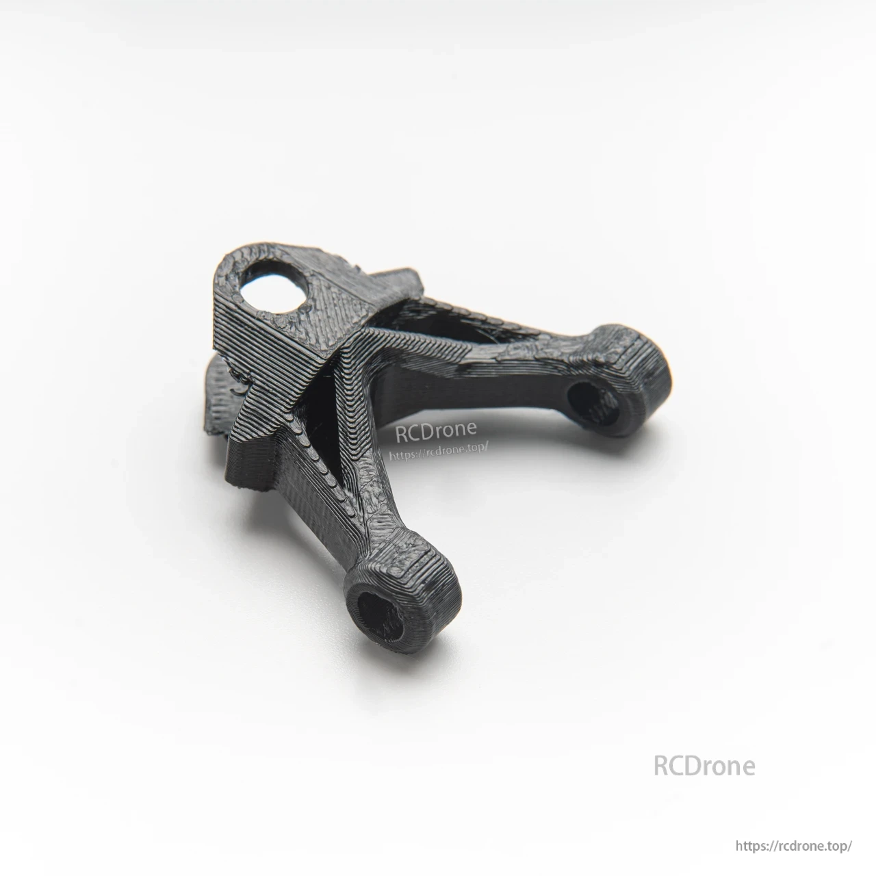 Black 3D-printed arm bracket with two mounting holes and reinforced cross brace